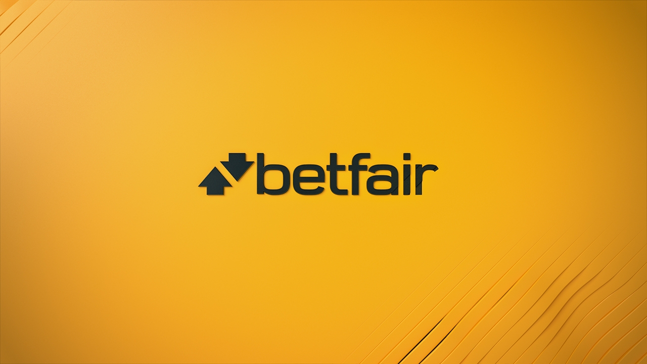 Надпись Betfair черными буквами на желтом фоне