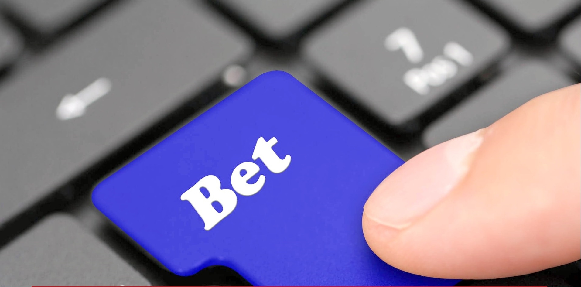 Синяя кнопка на клавиатуре с надписью Bet
