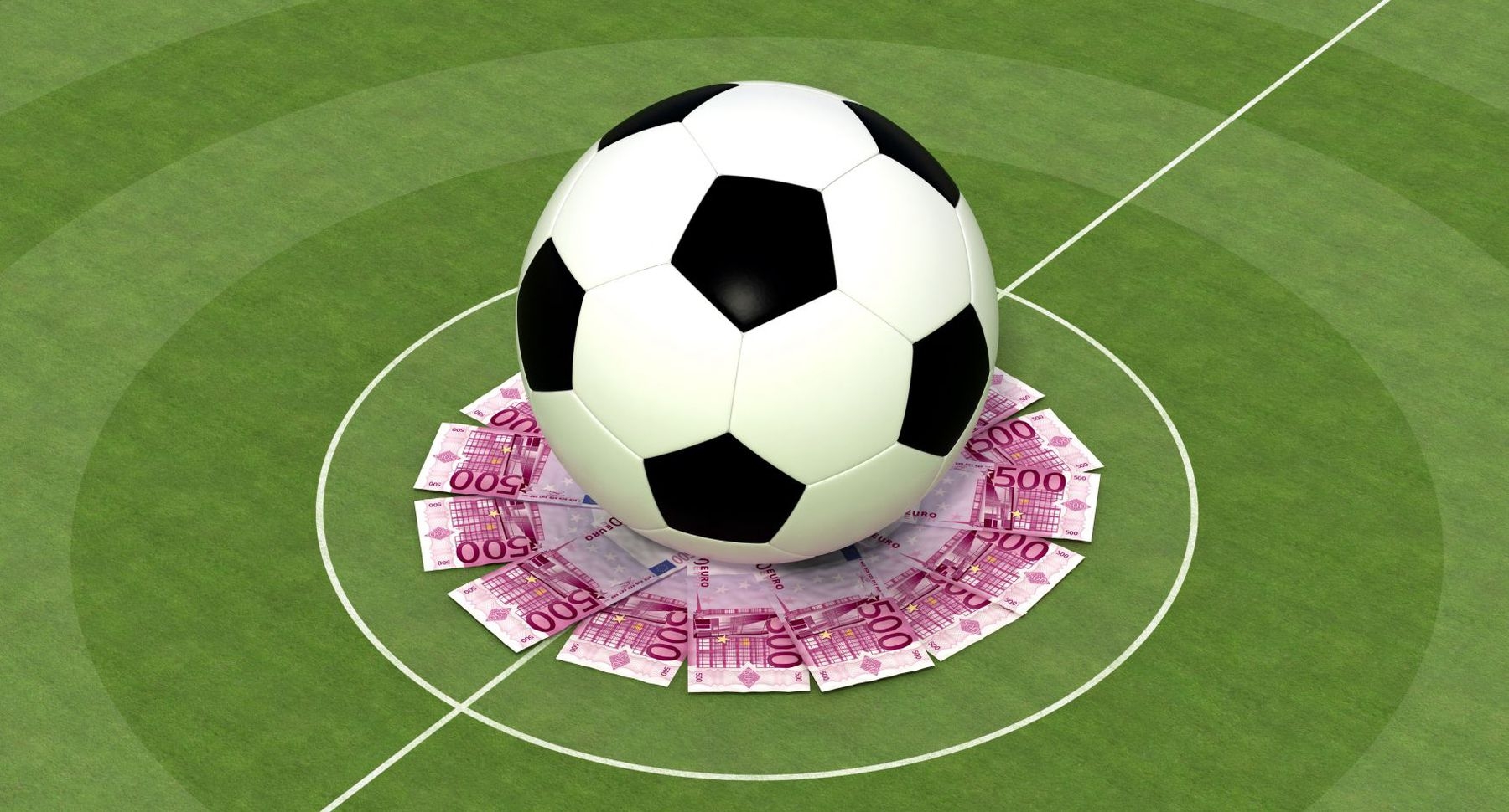Фцтбольным мяч лежит на поле в кругу их купюр по пятьсот евро