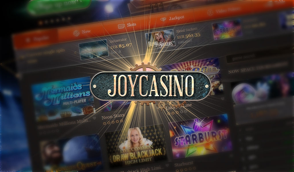 Фирменная надпись JoyCasino на фоне страница сайта казино