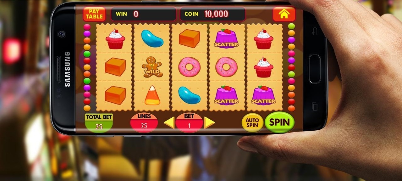 Гемблер играет на слоте со смартфона