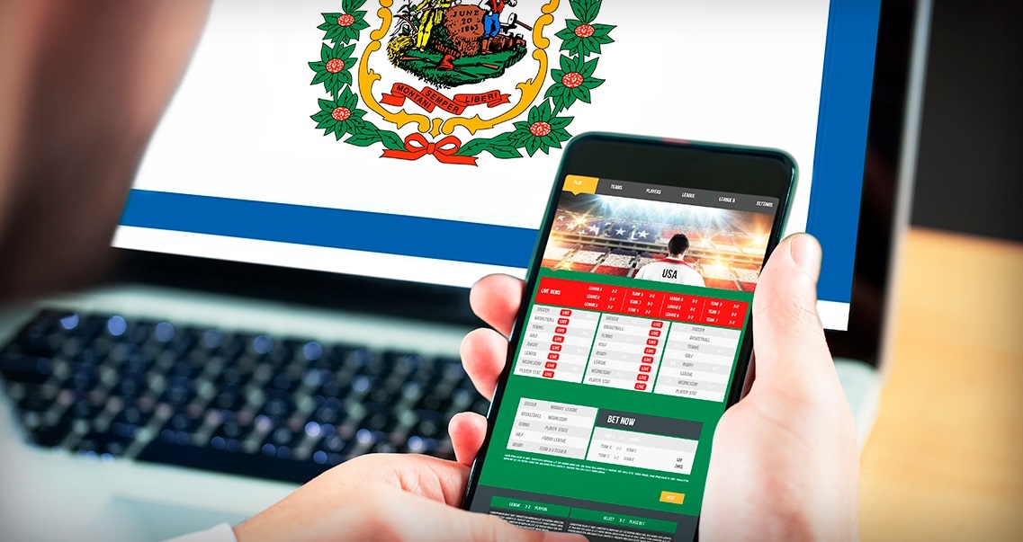 Азартный беттер просматривает сайт букмекерской конторы с мобильного телефона