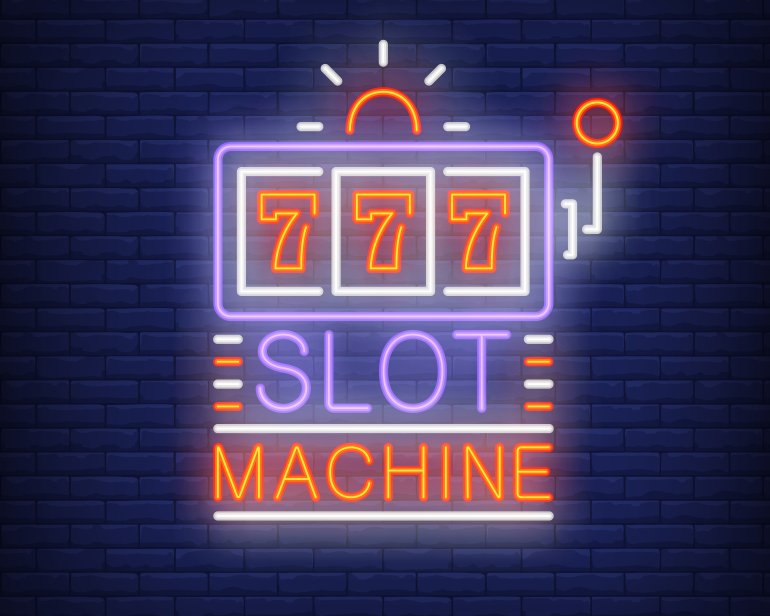 Игровой автомат неоновая вывеска на кирпичной стине